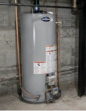 Residential water heater and plumbing system installation inside a Shelby Township, MI basement mechanical room.