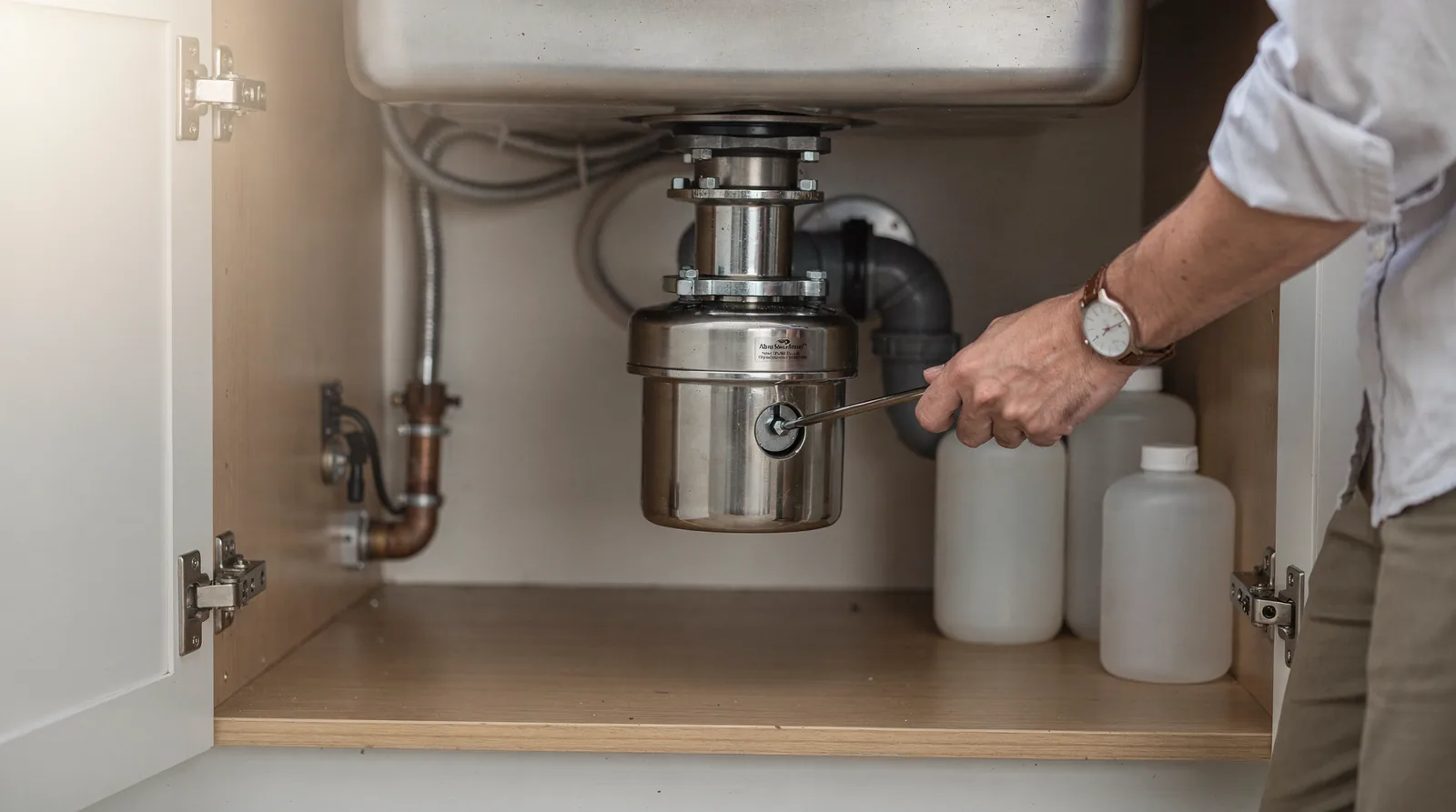 The disposal should be turned off any time you reach inside to clean it